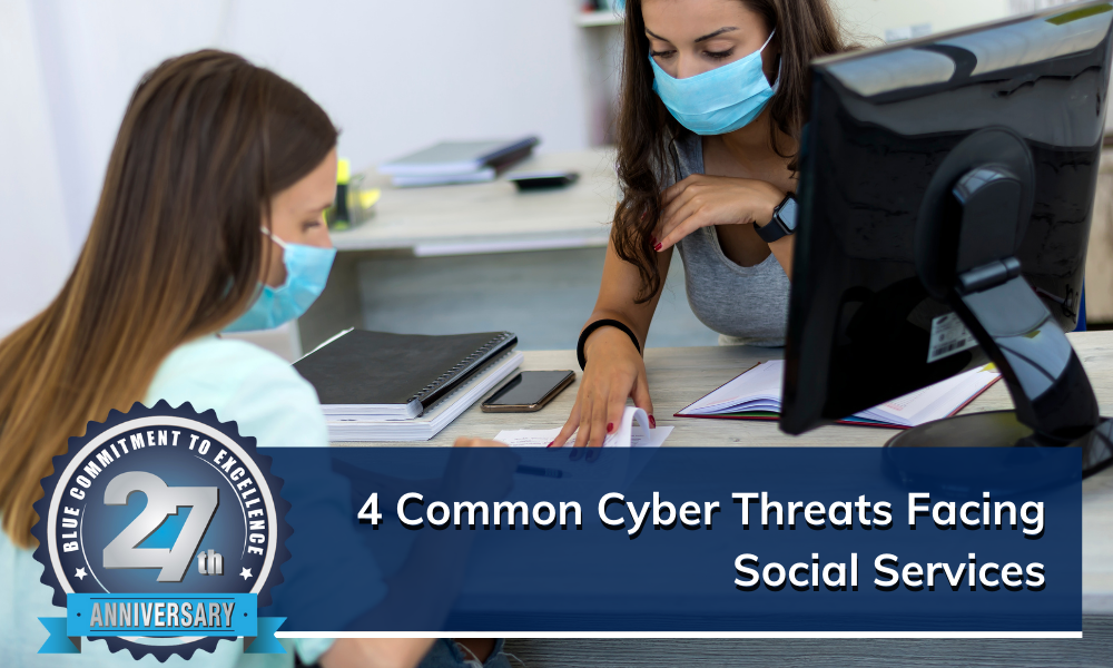 Two professional women collaborate across a desk while wearing blue medical masks, with a blog title banner overlaid across the image. The title reads, "4 Common Cyber Threats Facing Social Services." 